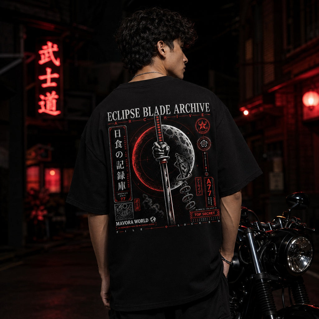 Person wearing a black t-shirt with 'Eclipse Blade Archive' design in an urban setting with neon lights.