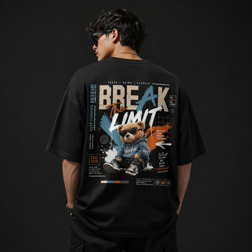 Person wearing a black t-shirt with a teddy bear graphic and 'Break The Limit' text on the back.