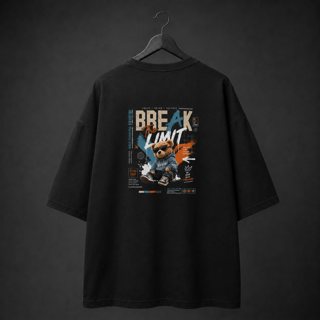 Black t-shirt with graphic design on a dark background