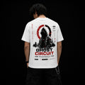 A man viewed from behind wearing a white t-shirt with a large graphic print on the back. The graphic features a hooded figure, a red circular design, and the text 'GHOST CIRCUIT' in black and red, with 'MAYGRAWORLD STREETWEAR' written below.