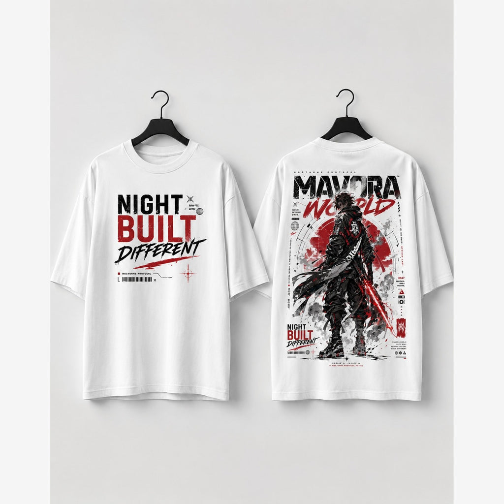 White t-shirt with 'Night Built Different' text on the front and graphic design on the back, hanging against a white background.