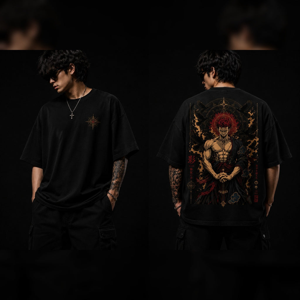 Person wearing a black t-shirt with a detailed graphic design on the back, standing against a dark background.