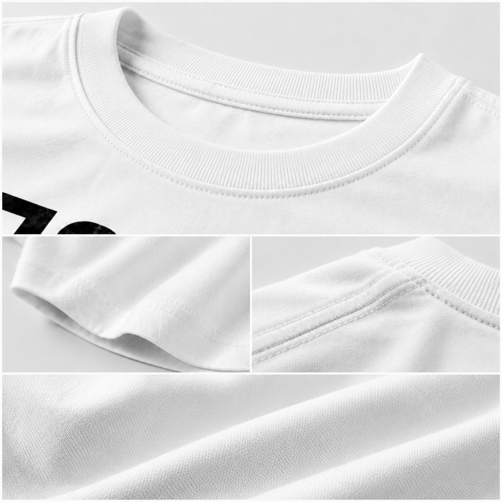 Close-up of a white t-shirt with text on a light gray background